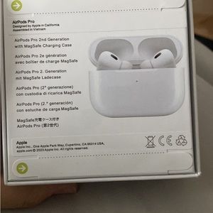 Apple AirPod pros 2nd gen with charging case and speaker on the case